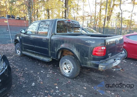2003 Ford F-150 Lariat/Xlt z USA, uszkodzony, nr VIN 1FTRW08663KB94976